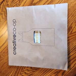 Creative Co-Op cotton woven apron with tassels